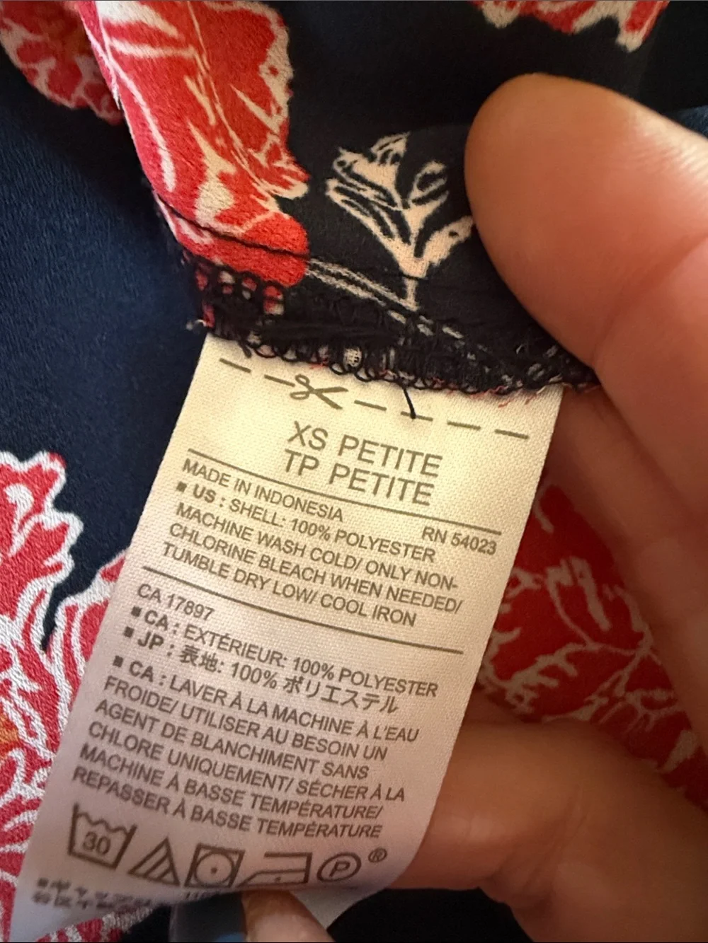 Two Banana Republic sleeveless blouses.